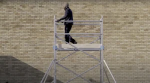 man working on a scaffold tower 